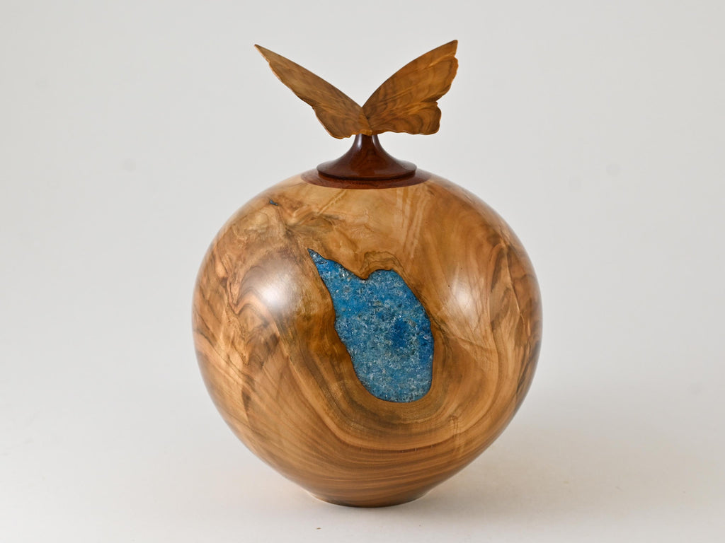Handmade wooden urn made of Cherry burl with a butterfly (175 c.i.)