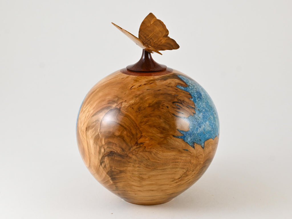 Handmade wooden urn made of Cherry burl with a butterfly (175 c.i.)