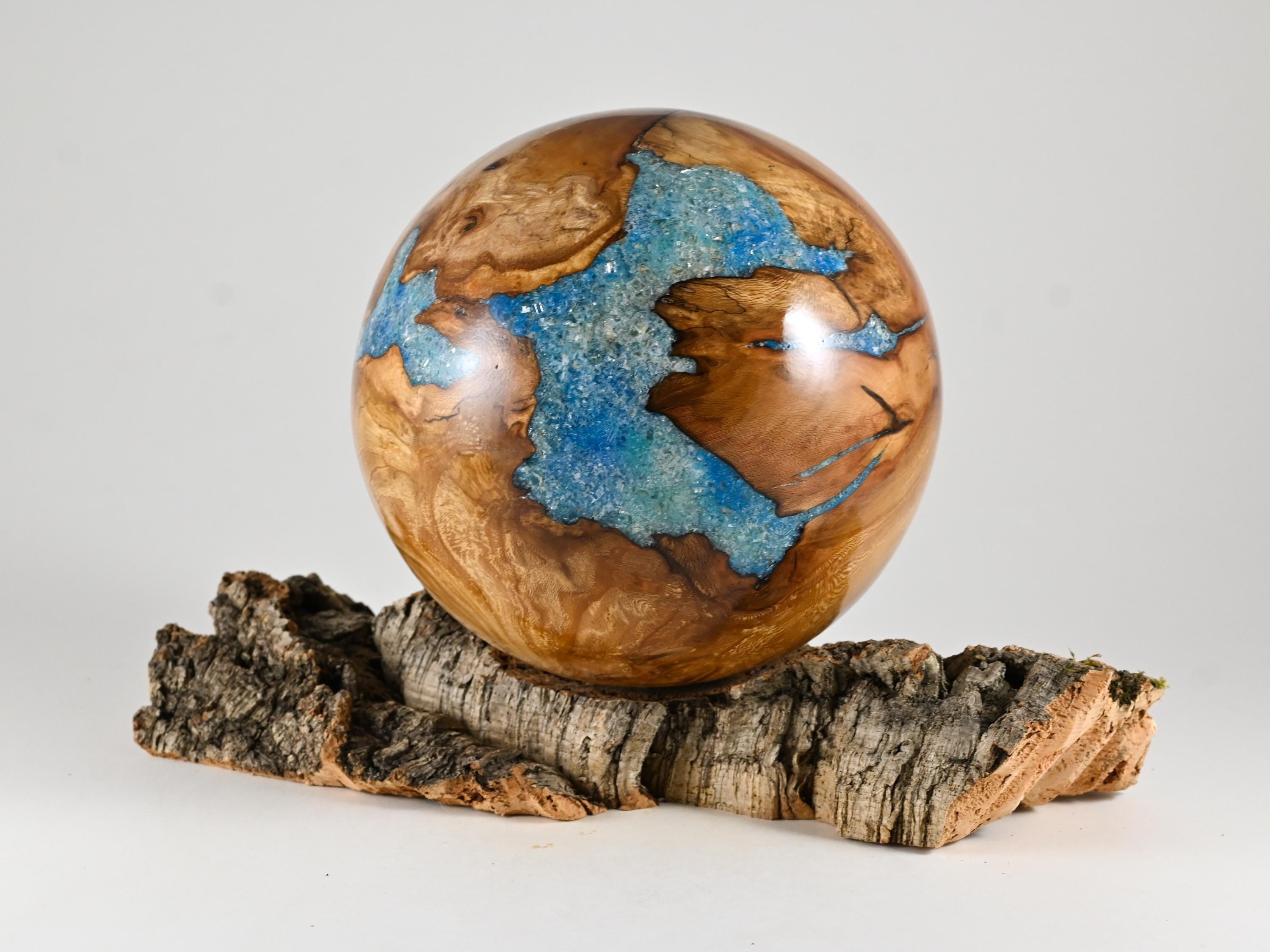 Handmade Siccamore Wood Urn with Blue Mineral Inlay on Cork stand