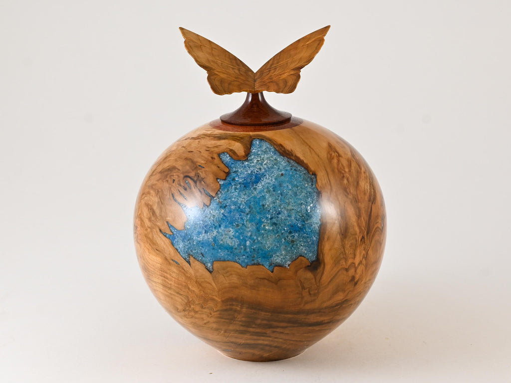 Handmade wooden urn made of Cherry burl with a butterfly (175 c.i.)