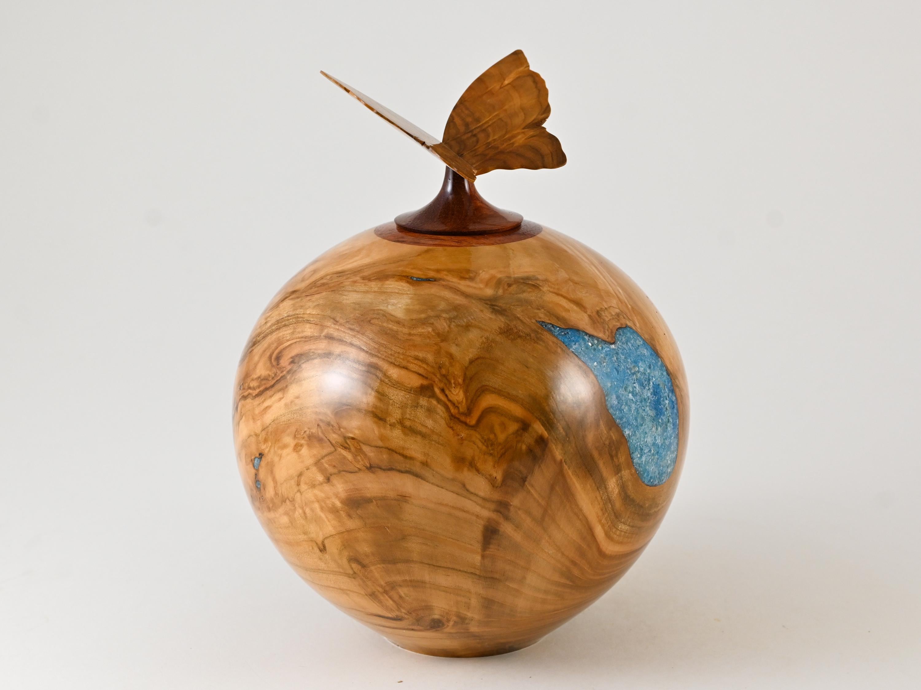 Handmade wooden urn made of Cherry burl with a butterfly (175 c.i.)